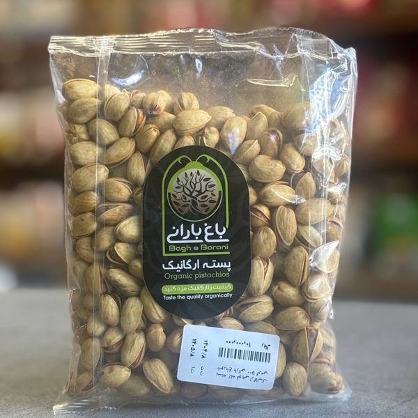 پسته ارگانیک باغ بارانی بوداده زعفرانی کله قوچی 500 گرم