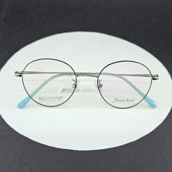 عینک طبی گرد دخترانه رنگ مشکی نقره‌ای مدل 1173