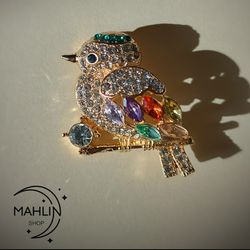 سنجاق سینه پرنده