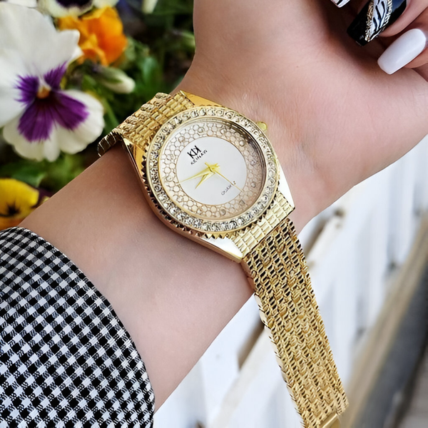 ساعت زنانه طلایی.(پس کرایه)