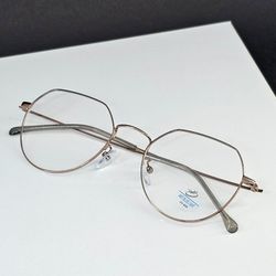 عینک طبی چند ضلعی شیشه بلوکات رنگ مسی مدل 4015