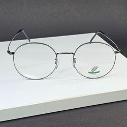 عینک طبی گرد پسرانه شیشه بلوکات نقره ای مدل 4010