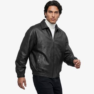 51465کاپشن مردانه باکسی چرم مصنوعی؛ نماد قدرت و استایل مدرن**
