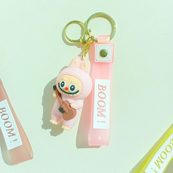 عروسک سرکلیدی سیلیکونی طرح لبوبو گیتارزن