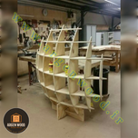 شلف دیواری چوبی مدرن و خاص محدب طرح نیم کره هفت طبقه