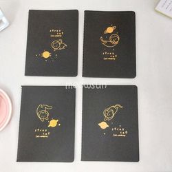 دفترچه سیاه برگ طلاکوب گربه فضانورد