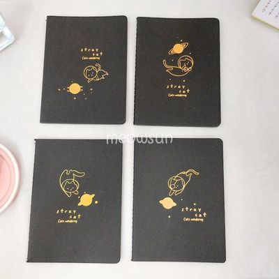 دفترچه سیاه برگ طلاکوب گربه فضانورد