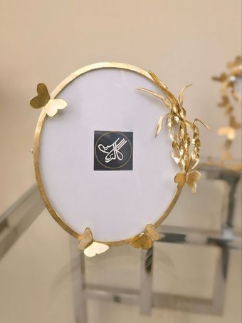 قاب عکس برگ مارپیج و پروانه