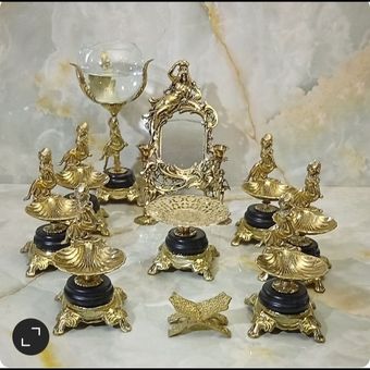 هفت سین برنزی مدل برگ صدف راهرا پایه سنگ مشکی با سرویس