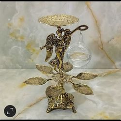 هفت سین برنزی مدل برگی و دختر ویولن زن با تنگ