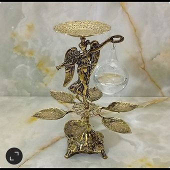 هفت سین برنزی مدل برگی و دختر ویولن زن با تنگ