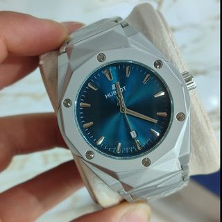 ساعت عقربه ای مردانه هابلوت فلزی قاب کهکشانی صفحه سبز کله غازی کد 8930