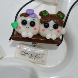 اویز ماشین قند شبتاب پسر کلاه بنفش