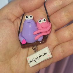 اویز ماشین خنگول بغلی صورتی و بنفش