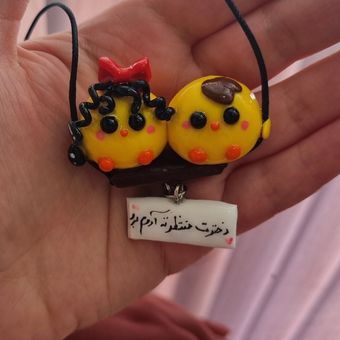 اویز ماشین جوجه دو تایی دختر چاقو دار