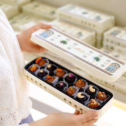 ترافل هارد باکس خرما با روکش شکلات و تزیین مغزیجات