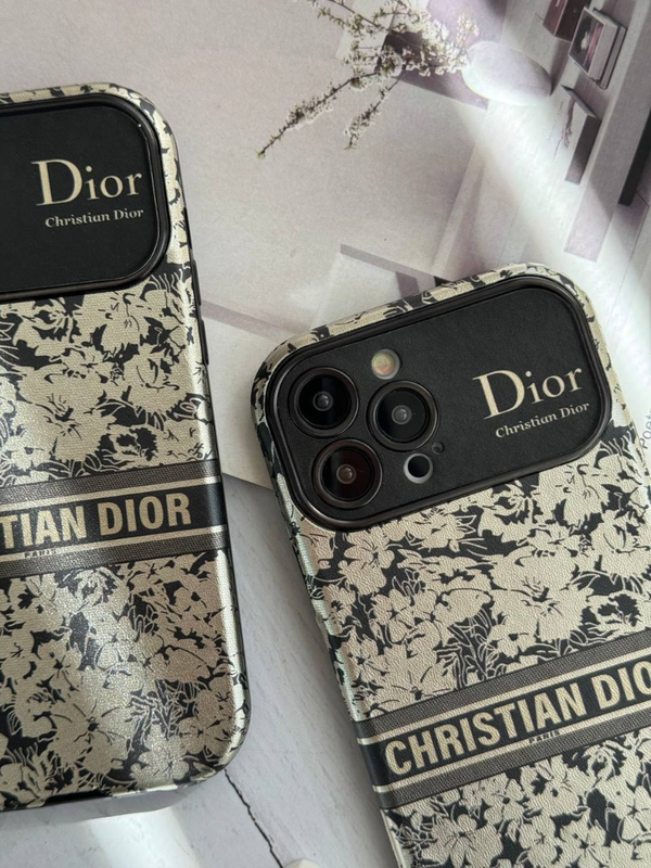 قاب گوشی آیفون دیور گلدار نقره‌ای محافظ لنز دار💐