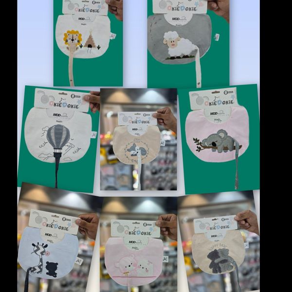 پیشبند نوزادی بند پستانکی عمده 12 عددی بند پستانک‌دار پارچه مخمل گلدوزی ارشیدو اوکی دوکی