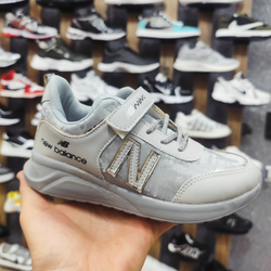 کفش نیوبالانس پتینه بچه گانه در دو رنگ مشکی و طوسی