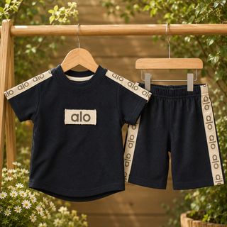 ست تیشرت و شلوارک جنس بیسکویتی طرح alo سایز 45 و 50