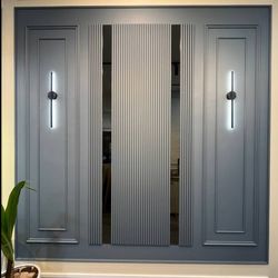 قاب بندی دیوار همراه با نور پردازی و رنگ امیزی