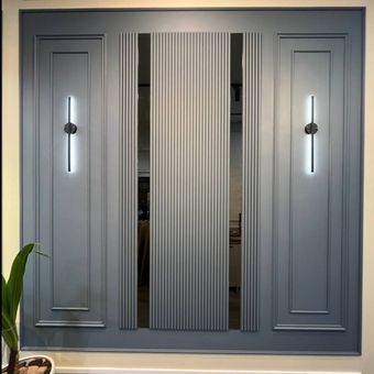 قاب بندی دیوار همراه با نور پردازی و رنگ امیزی