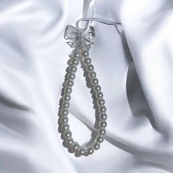 آویز موبایل مرواریدی مدل پاپیون کریستالی