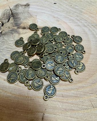 سکه الیزابت رنگ زیرخاکی 9 میل 
بسته 20 گرمی (حدودا 60 عدد)