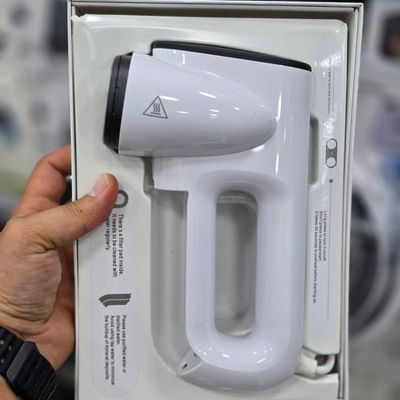 دستگاه اتو بخار مکشی  Aspirating Steamer / Suction-Type Ironing Machine