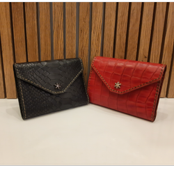 کیف پول زنانه چرم مدل رادیا