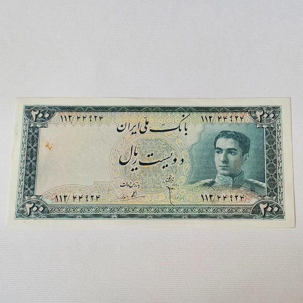 اسکناس 20ریال سری سوم محمدرضاشاه ایراد لک روی فلیگران دارد