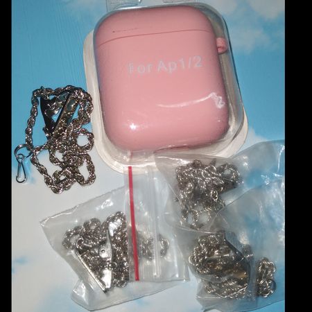 کاور ایرپاد سیلیکونی Airpod 1/2 به همراه آویز و زنجیر رنگ صورتی