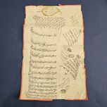 سند مصالحه ارث با امضا جلال الدوله شاهزاده قاجاری وتذهیب اب طلا سال1307 هجری قمری