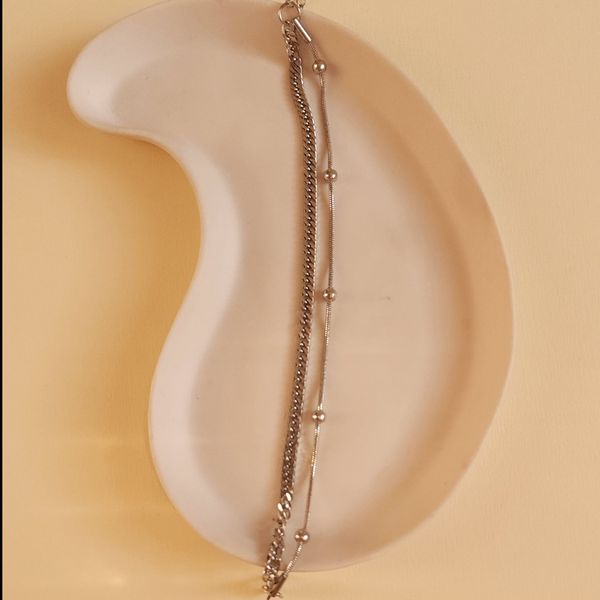 دستنبند دولاین کارتیر نقره ای