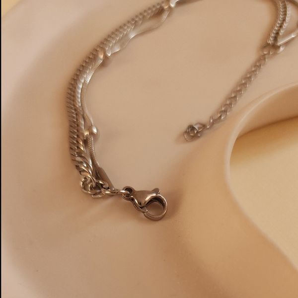 دستنبند دولاین کارتیر نقره ای