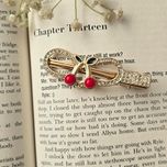 گیره فلزی آلبالویی