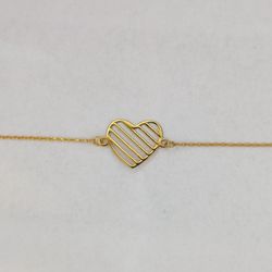 دستبند طلا 18 عیار زنانه گالری طرح قلب راه راه میا گالری