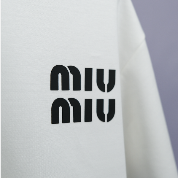 تیشرت وارداتی باکسی طرح miu miu شیری
