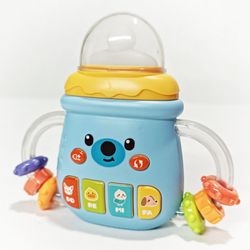 اسباب بازی موزیکال چراغ دار طرح شیشه شیر