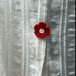 بافت کاموا سفارشی طرح گل کاور دکمه