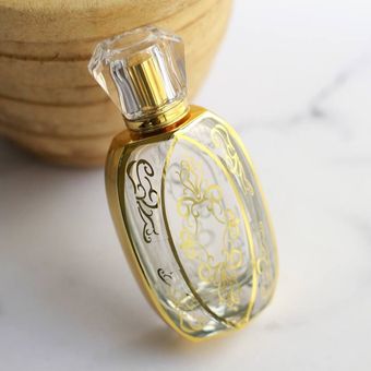 شیشه 50 گرمی طلاکوب‌