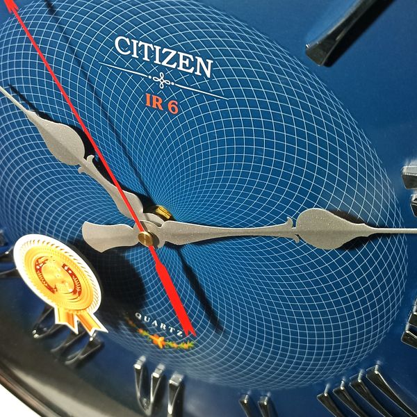 ساعت دیواری سیتی زن مدل 057*299