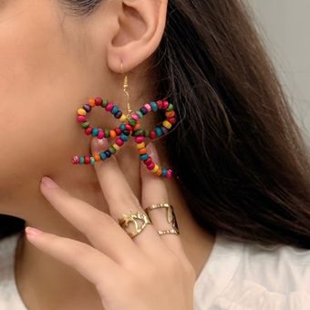 گوشواره پاپیونی دستساز با مهره های چوبی رنگی