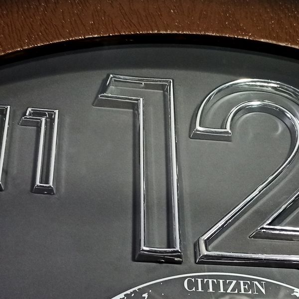 ساعت دیواری سیتی زن مدل ال اس 018 طرح کره*203