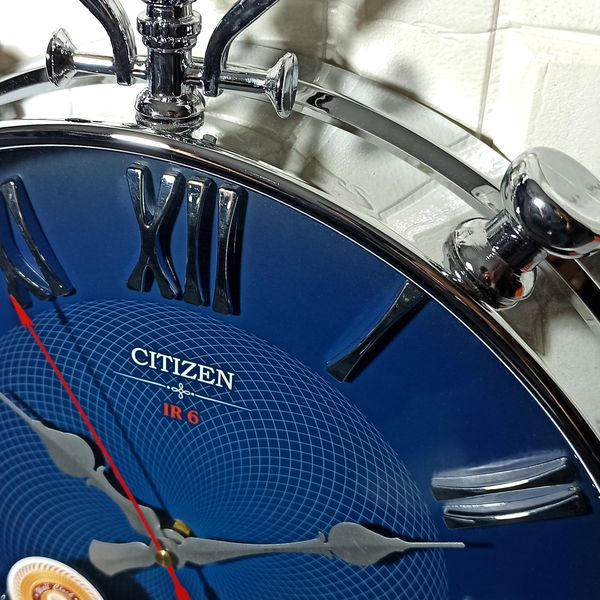 ساعت دیواری سیتی زن مدل 057*299