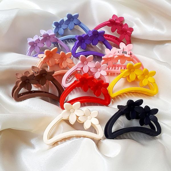 کلیپس مو زنانه مدل شمعی مات صندوقی و گلدار بسته 2 عددی