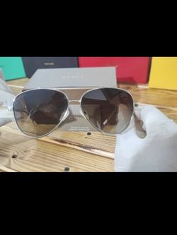 عینک آفتابی لوکس گوچی مدل GG0023S - فریم نقره‌ای با جزئیات رنگی