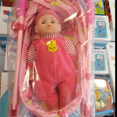 کالسکه فلزی بزرگ به همراه عروسک موزیکال