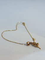 پلاک گل همراه با زنجیر