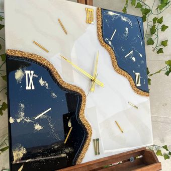 ساعت دیواری رزینی طرح آراد مدرن و دستساز